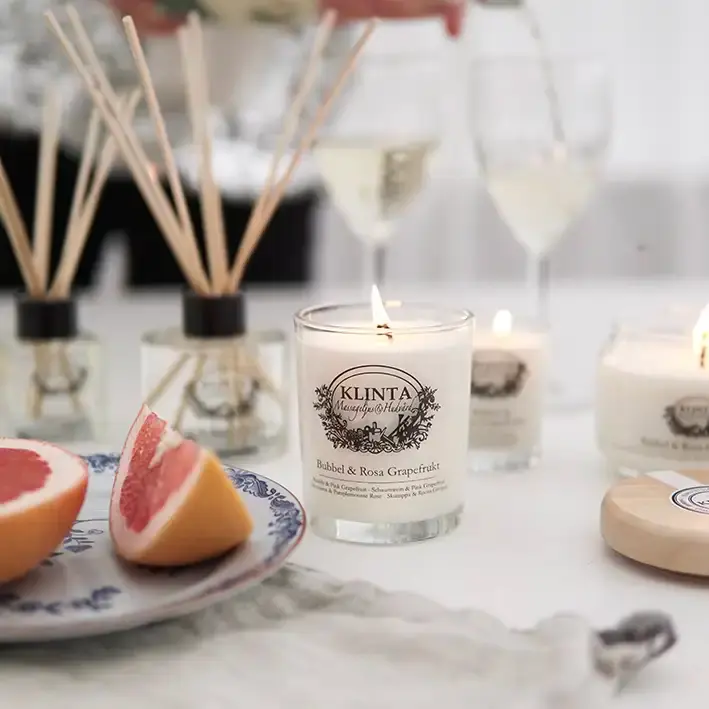 Geurkaars / Doftljus & Massageljus Bubbel & Rosa Grapefrukt 45 uur - Klinta