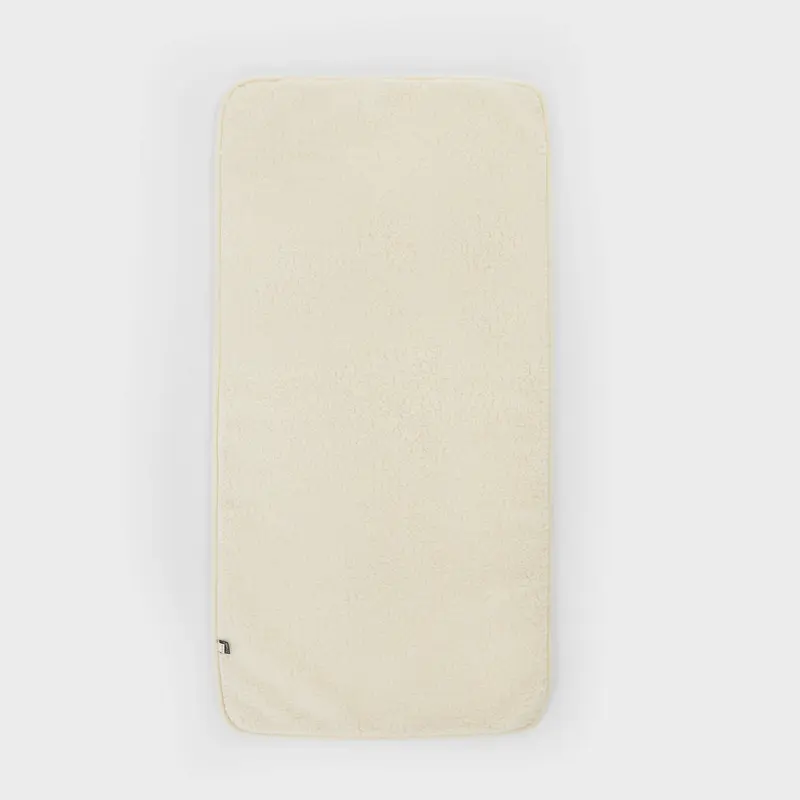 Onderlegger voor ledikant - 60x120cm - Merinowol - Naturel - Kico label